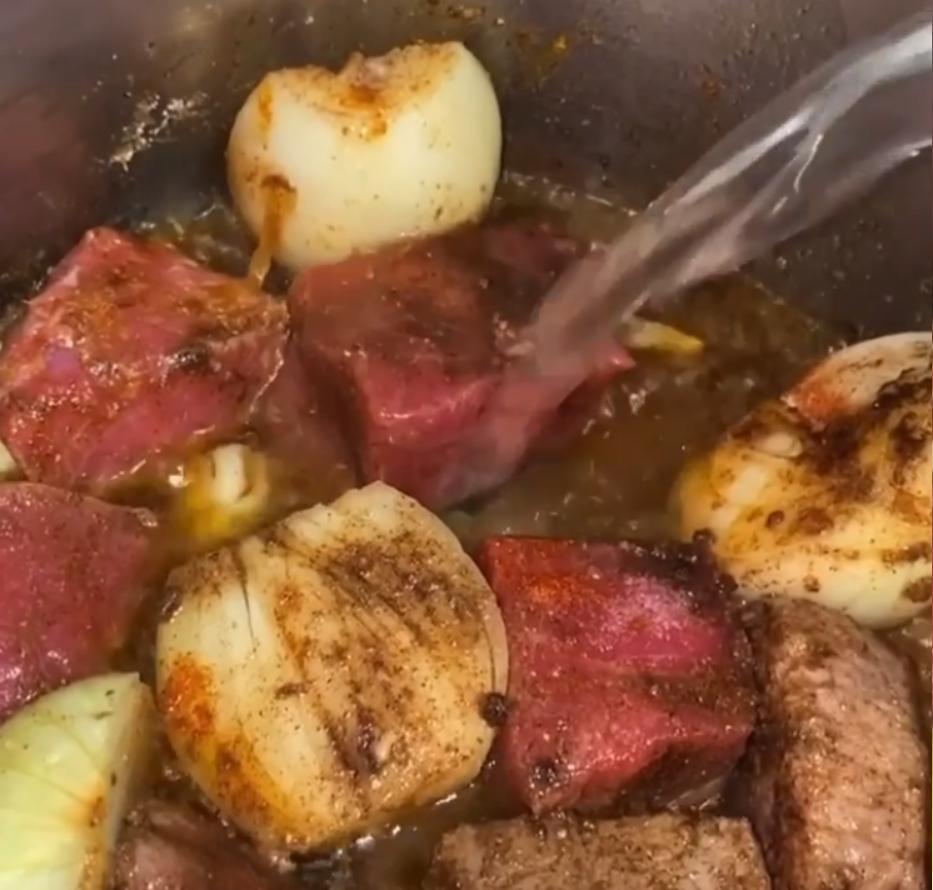 Step 1.1: Put the beef in a pot with the onions, garlic, salt, pepper, garlic powder, ginger powder, cayenne pepper, clove powder, and all spice, then add the boiling water