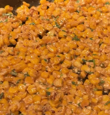 Step 2.1: Remove the charred corn and mix it with mayo, lime juice, cotija cheese, chili powder, and salt