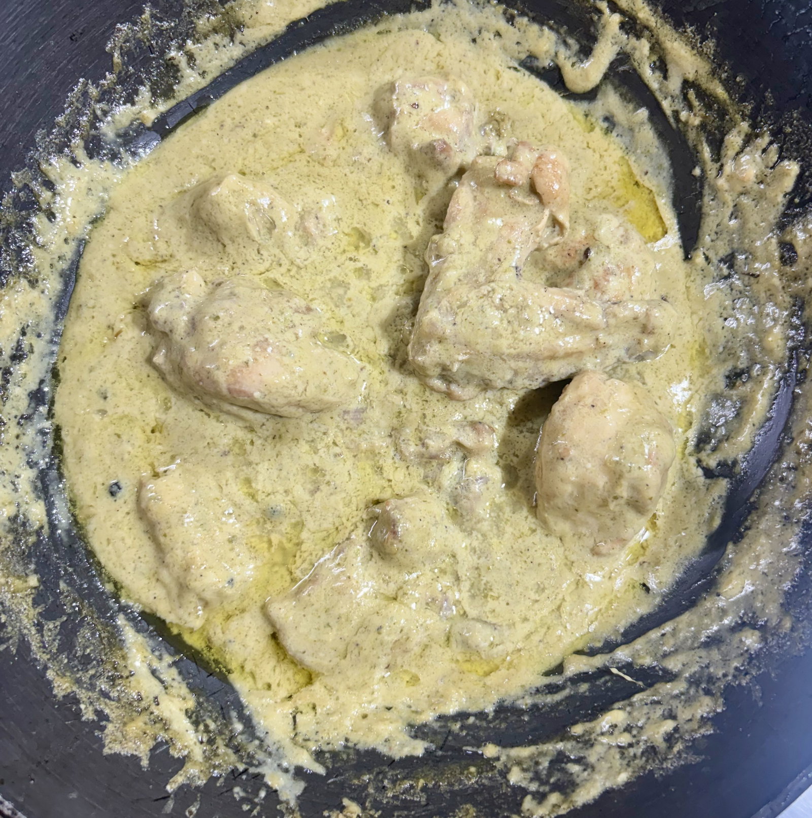 Step 4.1: Cover and simmer over low heat for 15–20 minutes, stirring occasionally, until the chicken is tender and the gravy is thick and coats the pieces