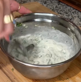 Step 2.1: Mix the plain greek yogurt, grated cucumber, chopped fresh dill, lemon juice, and minced garlic in a bowl