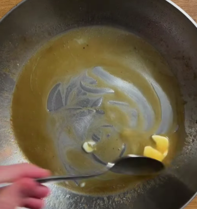 Step 3.1: Add a knob of cold butter to the pan and stir to create a jus