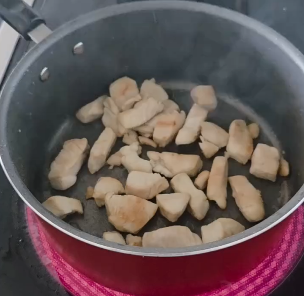 Step 1.1: Heat the garlic infused olive oil in a saucepan and cook the diced chicken breast until browned