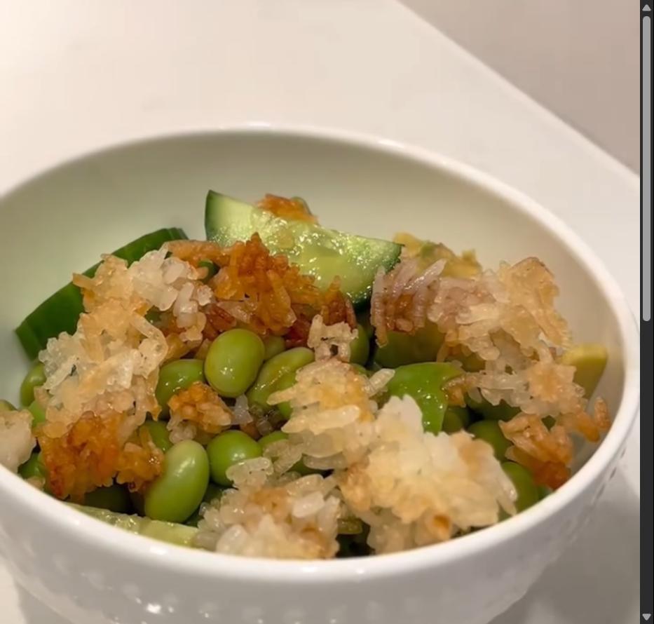 Step 3.1: Top the salad with crispy rice and drizzle the sauce over the top