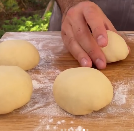 Step 3.1: Divide the dough into 100 g balls and shape them into smooth rounds