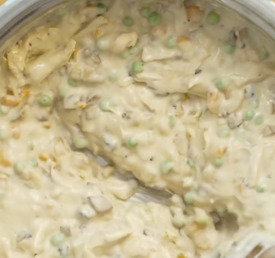 Step 3.1: Add peas and the shredded chicken
