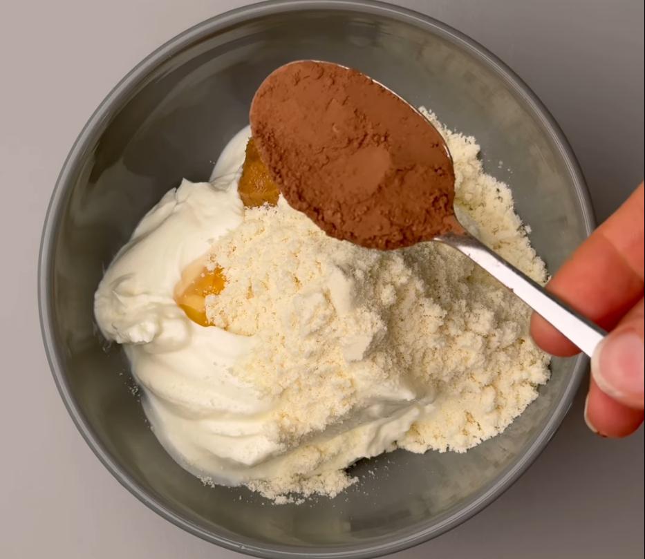 Step 1.1: Mix the Greek yogurt, vanilla protein powder, cocoa powder, peanut butter, and honey until smooth