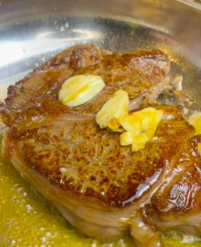 Step 2.1: Heat a pan over medium-high heat with a little oil and cook the steak for 2-3 minutes per side or to your preferred doneness