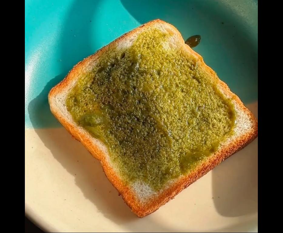 Step 3.1: Spread a layer of green chutney on each toast