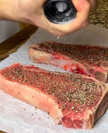 Step 2.1: Pat the steaks dry and press the crushed peppercorns onto both sides