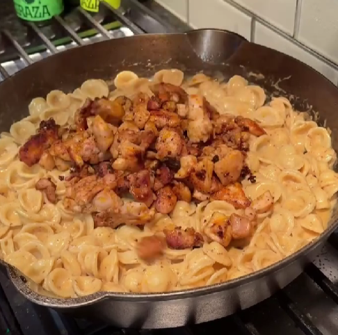 Step 1.1: Add cooked pasta and toss to coat