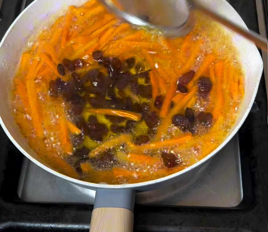 Step 1.1: Fry the raisins until plump and set aside