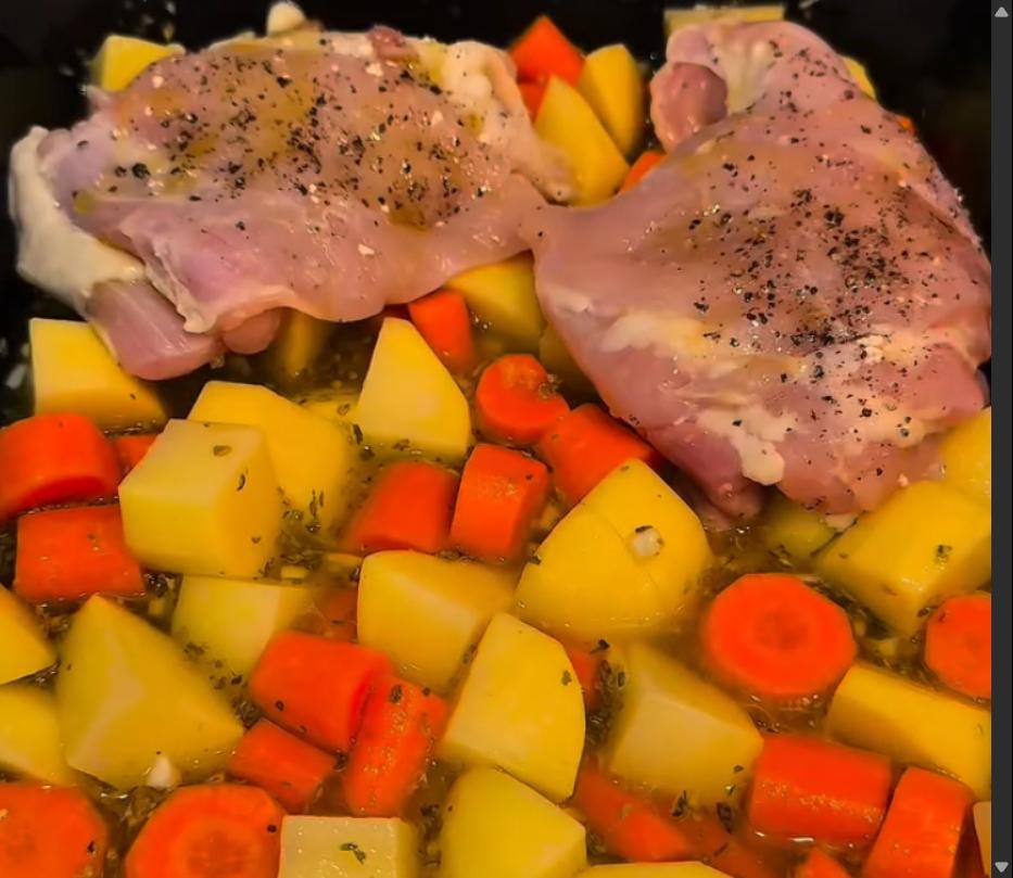 Step 1.1: Place the seasoned chicken on top of the vegetables in the baking dish