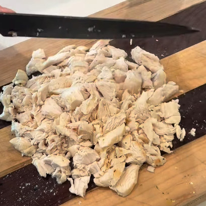 Step 1.1: Shred the chicken and add it back to the soup