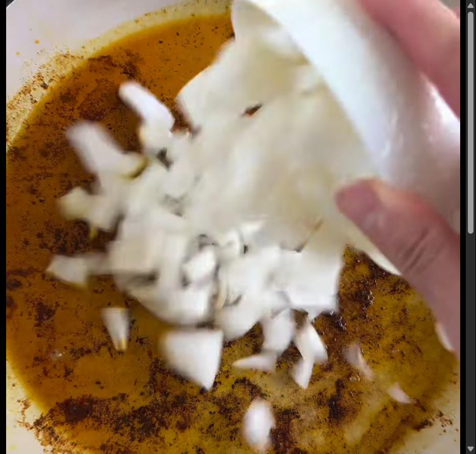 Step 1.1: Add diced onions and minced garlic to the pot