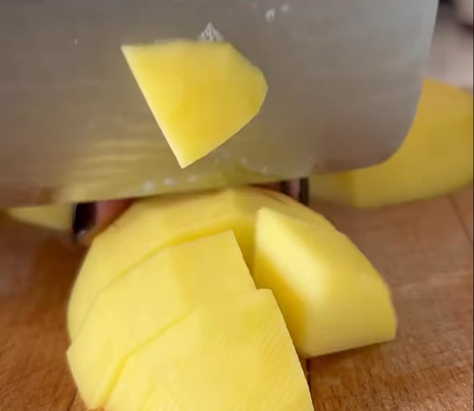 Step 1.1: Peel and cut the potatoes larger than the carrots