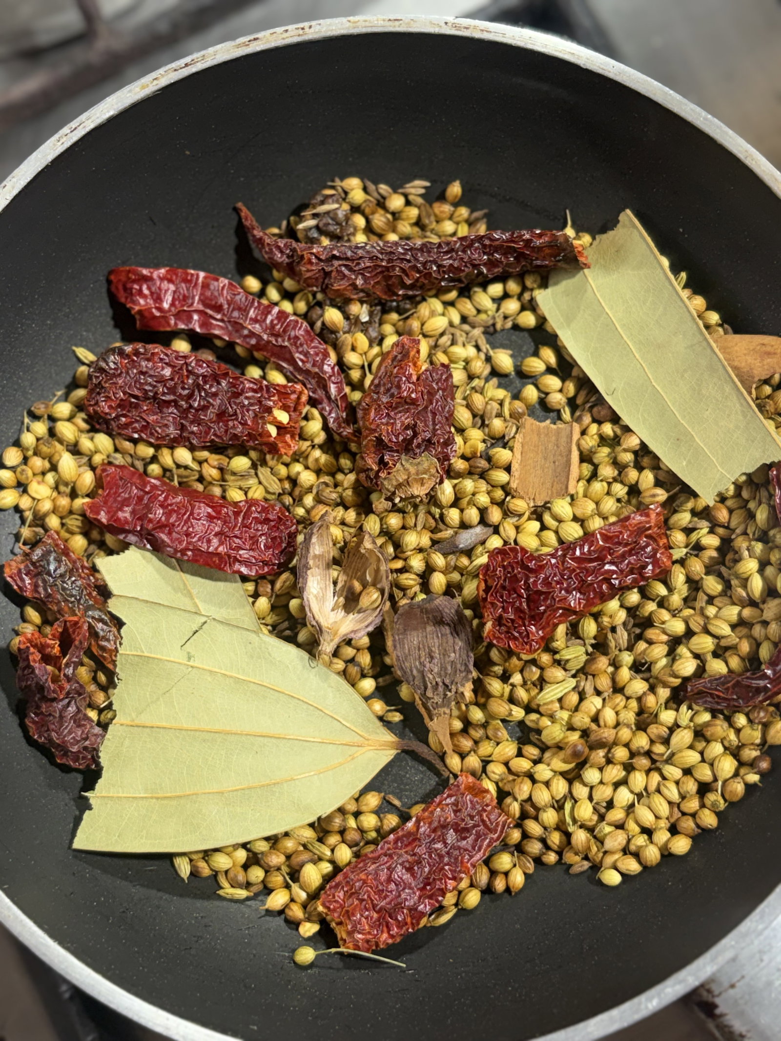 Step 1.1: Stir continuously for 2–3 minutes until the spices become fragrant and slightly darker