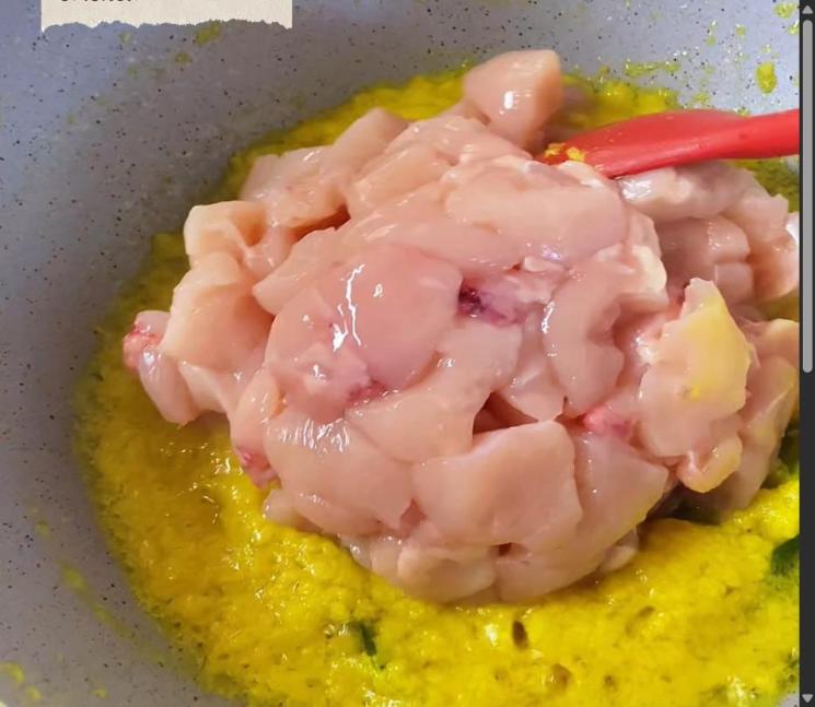 Step 3.1: Add the chicken cubes and stir to coat with the spice paste
