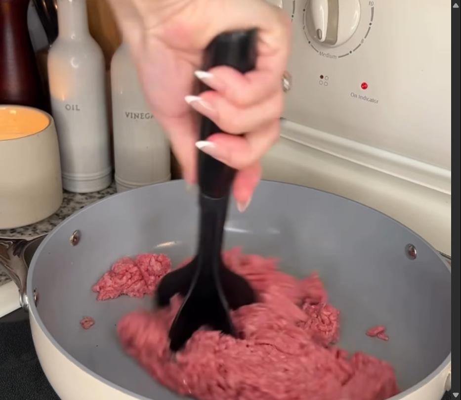 Step 1.1: Heat olive oil in a large sauté pan and brown ground beef until cooked through and lightly browned