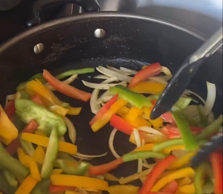 Step 1.1: Cook capsicums and onion in a hot pan with avocado oil, adding Mexican fajita seasoning, until softened and charred