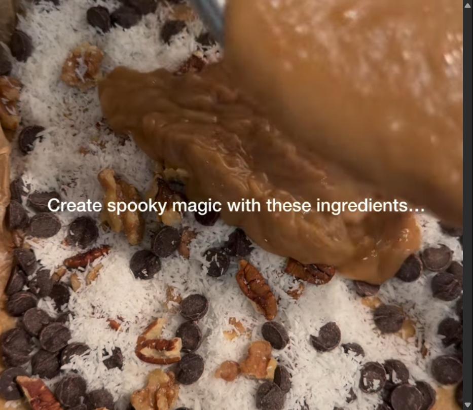 Step 3.1: Pour the peanut butter filling over the toppings and spread evenly