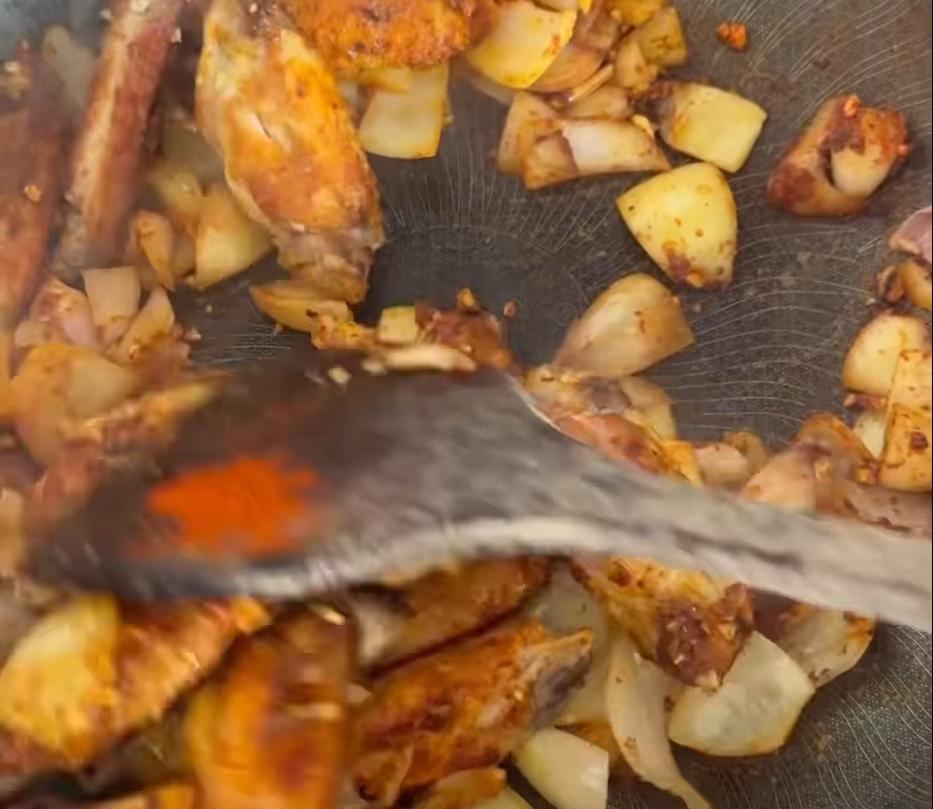 Step 1.1: Mix in the curry powder, paprika, turmeric, and Chu Hou sauce until the wings are evenly coated