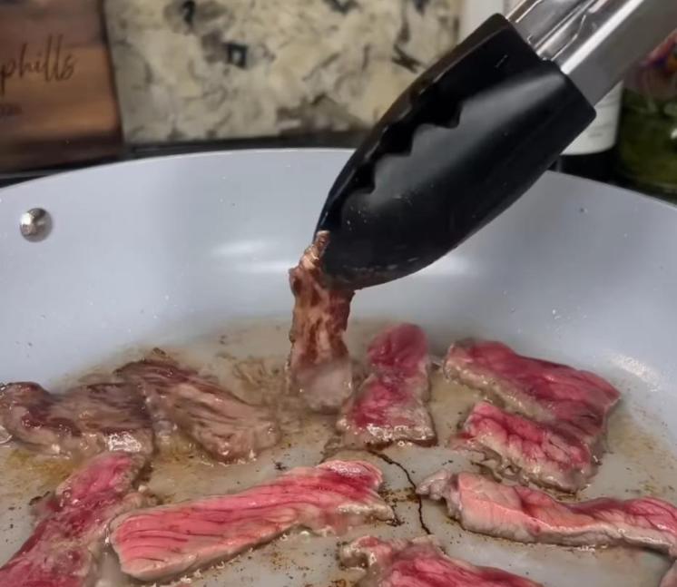 Step 2.1: Heat avocado oil over medium-high heat and sear beef strips in batches on both sides until browned
