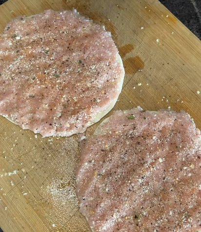 Step 1.1: Season with chicken salt and black pepper, and spread breadcrumbs on top