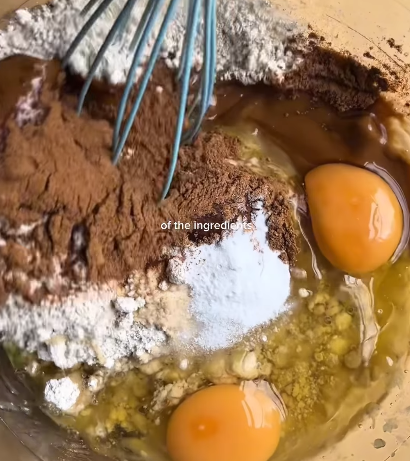 Step 1.1: Add the flour, olive oil, melted Biscoff spread, maple syrup or honey, eggs, cinnamon, baking soda, and salt to the bowl