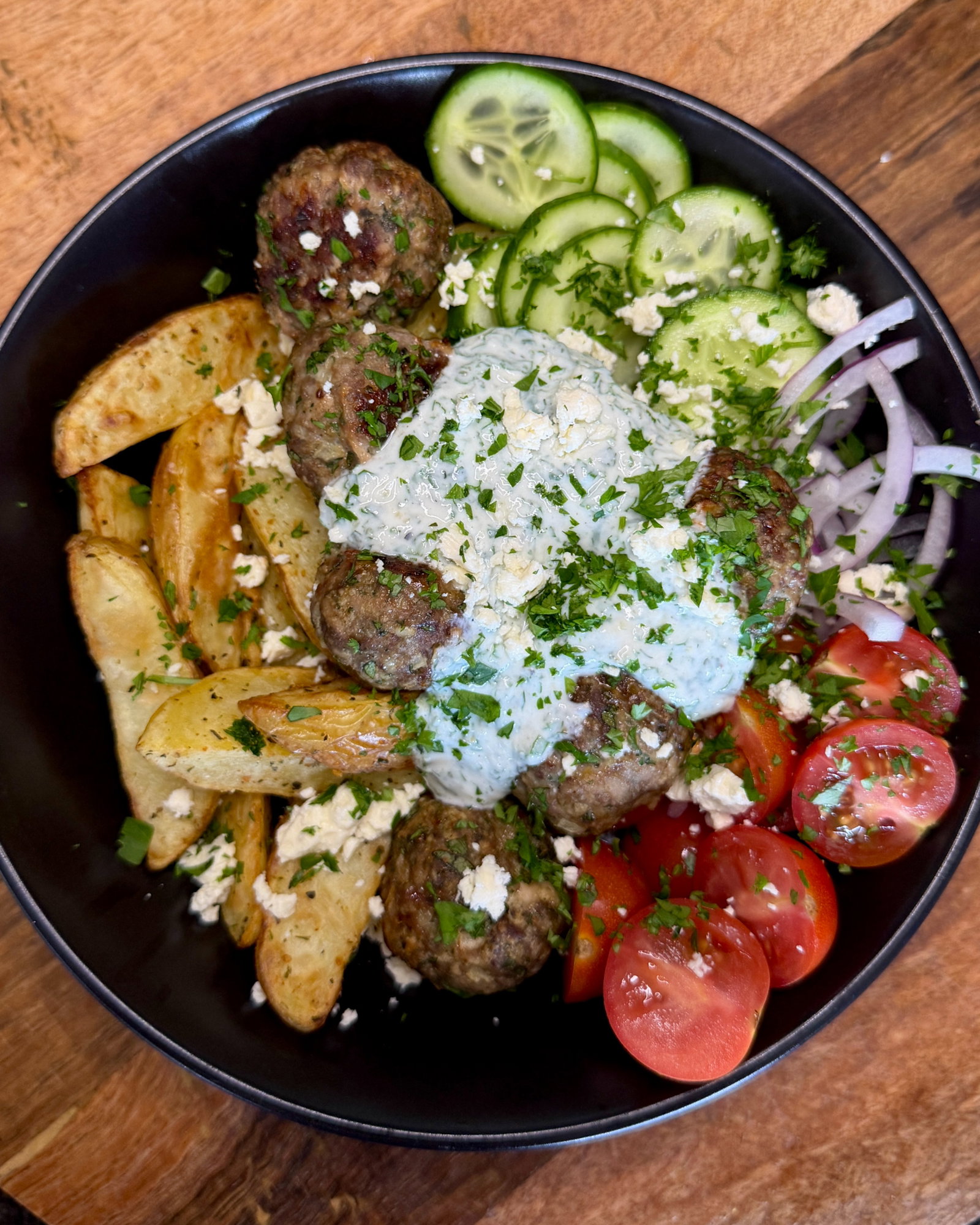 Mediterranean Beef Meatballs with Potato Wedges and Garlic Yoghurt Sauce recipe