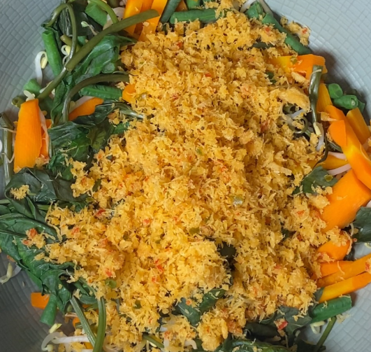 Step 4.1: In a bowl, mix the blanched vegetables with the coconut mixture until evenly coated