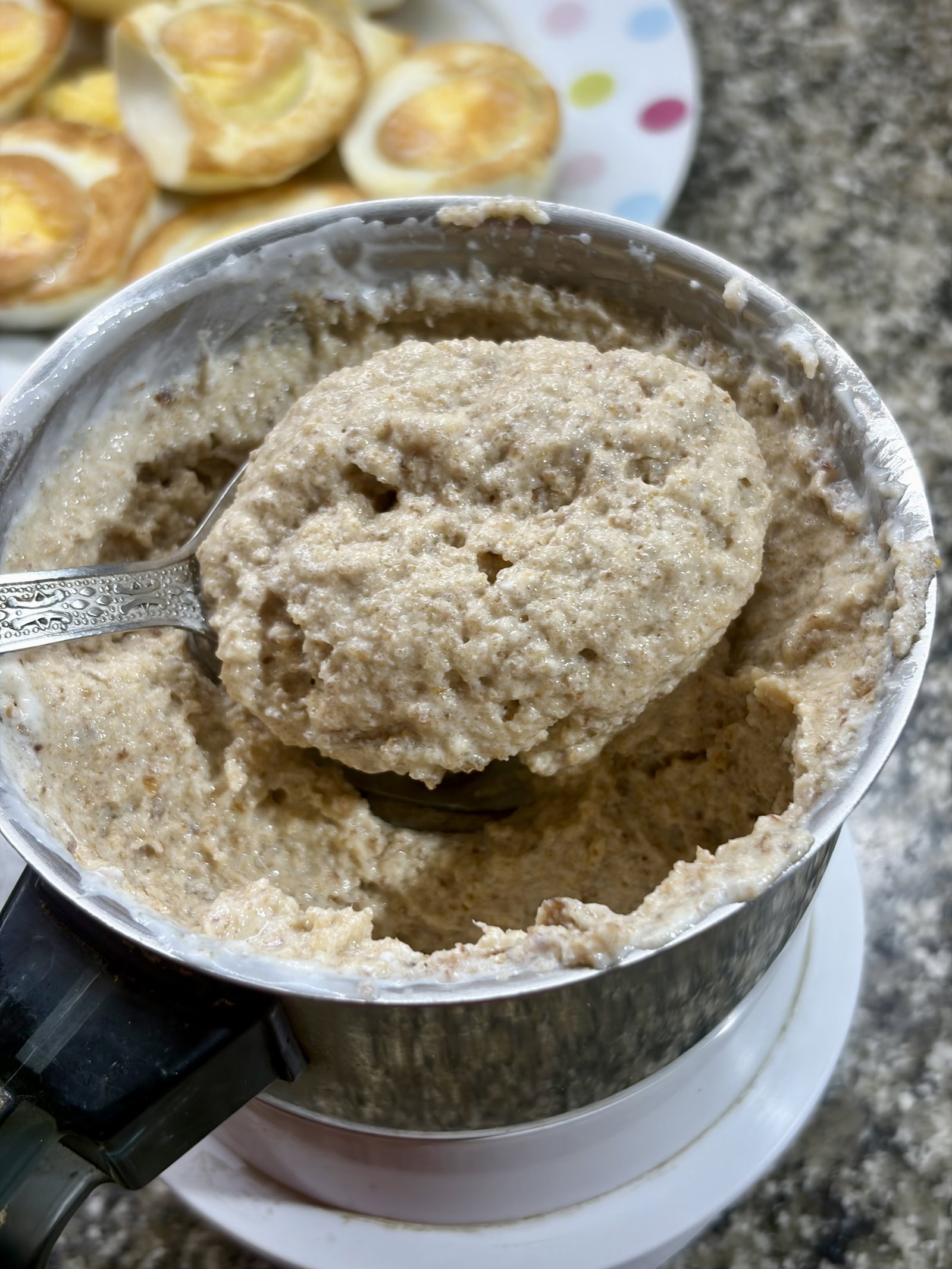 Step 1.2: In a grinder, combine the fried onions, cashews, yogurt, and ginger-garlic paste