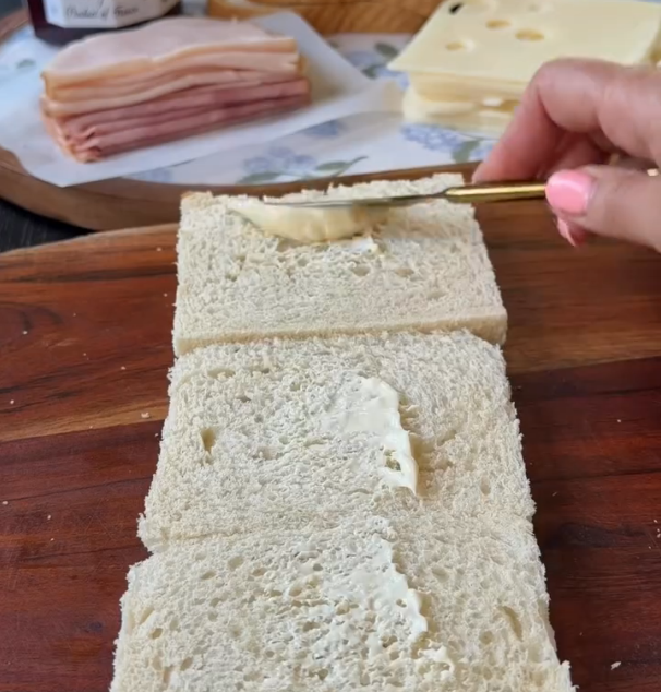 Step 1.1: Cut the crusts off the bread