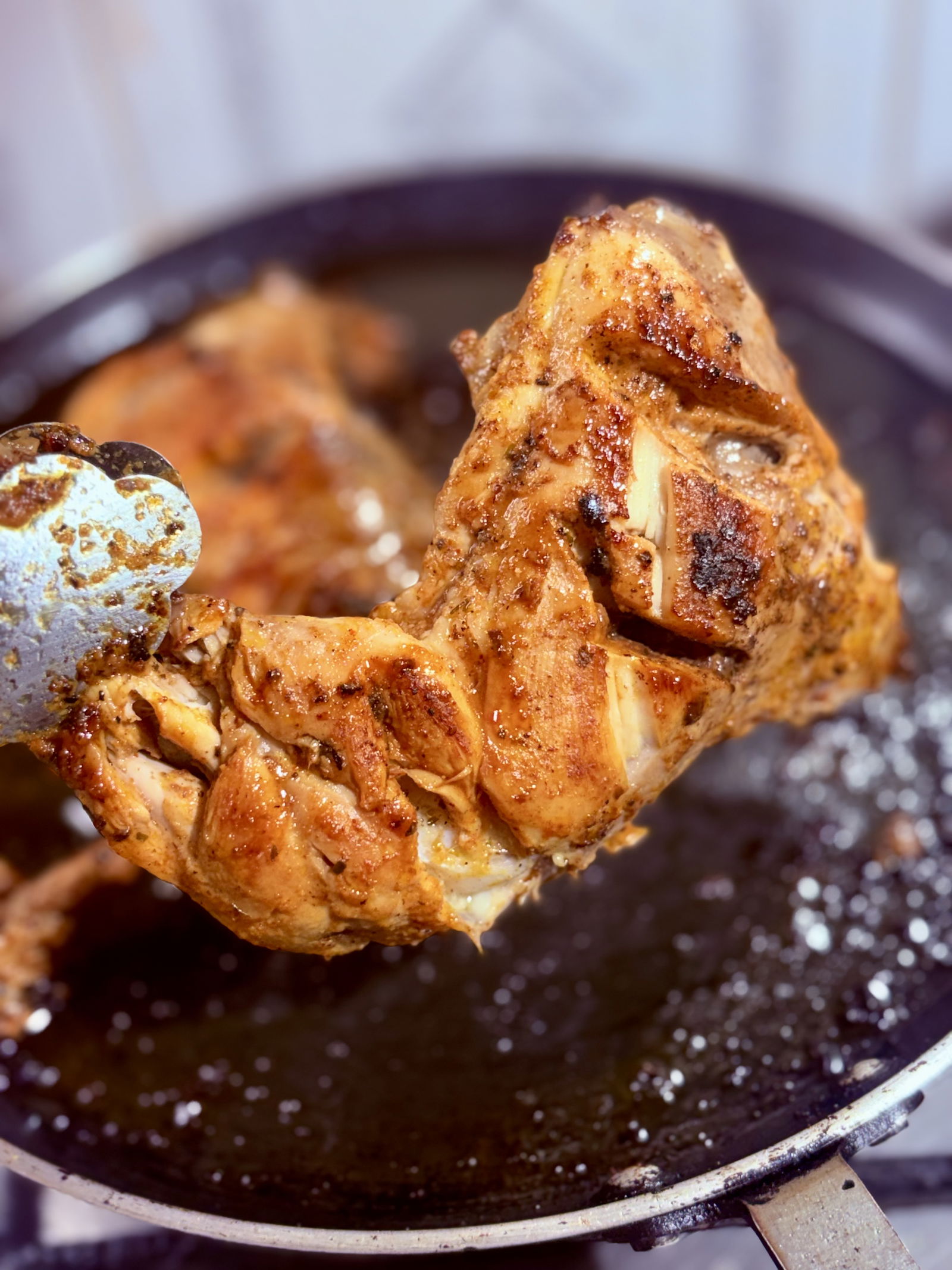 Step 1.1: Once the chicken is tender and the oil begins to separate from the masala, remove the lid