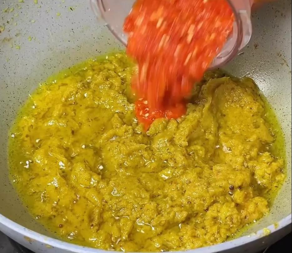 Step 1.1: Once the liquid is reduced, add blended red chilies and ambu-ambu