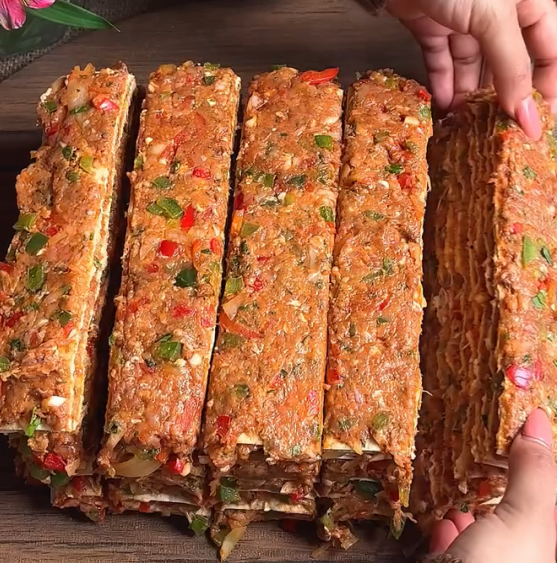 Step 1.1: Cut the layered tortillas diagonally, flip them, lay them flat, and place them adjacent to each other