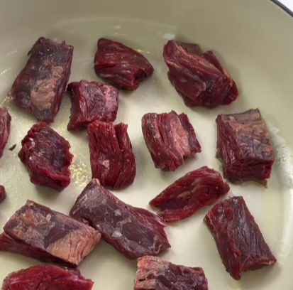Step 1.1: Sauté the steak cubes in a hot skillet, letting each side caramelize beautifully