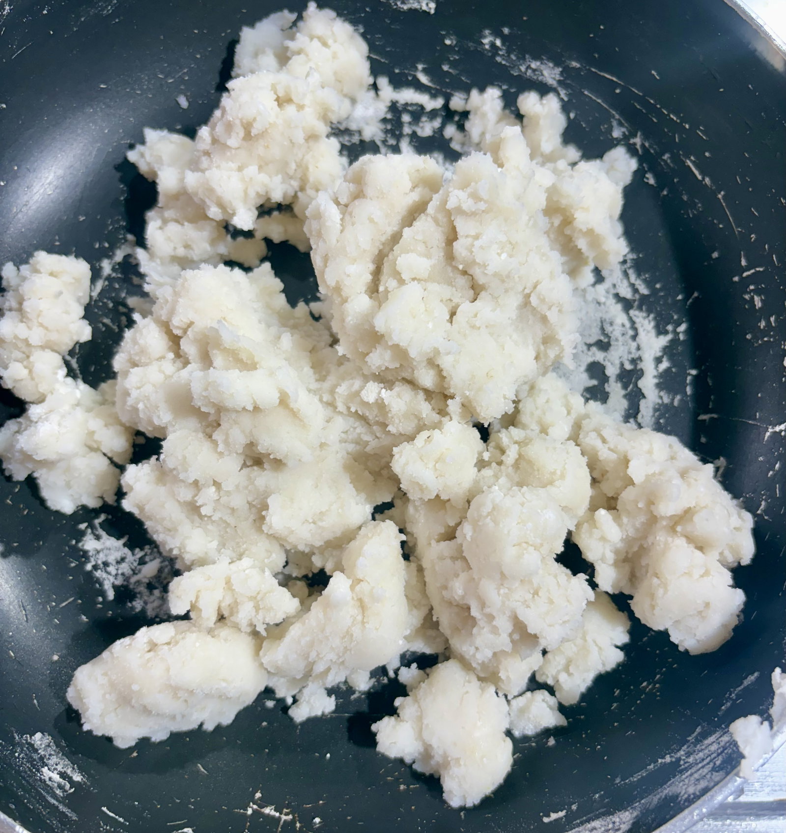 Step 1.1: Mix continuously until the flour absorbs the water and forms a dough