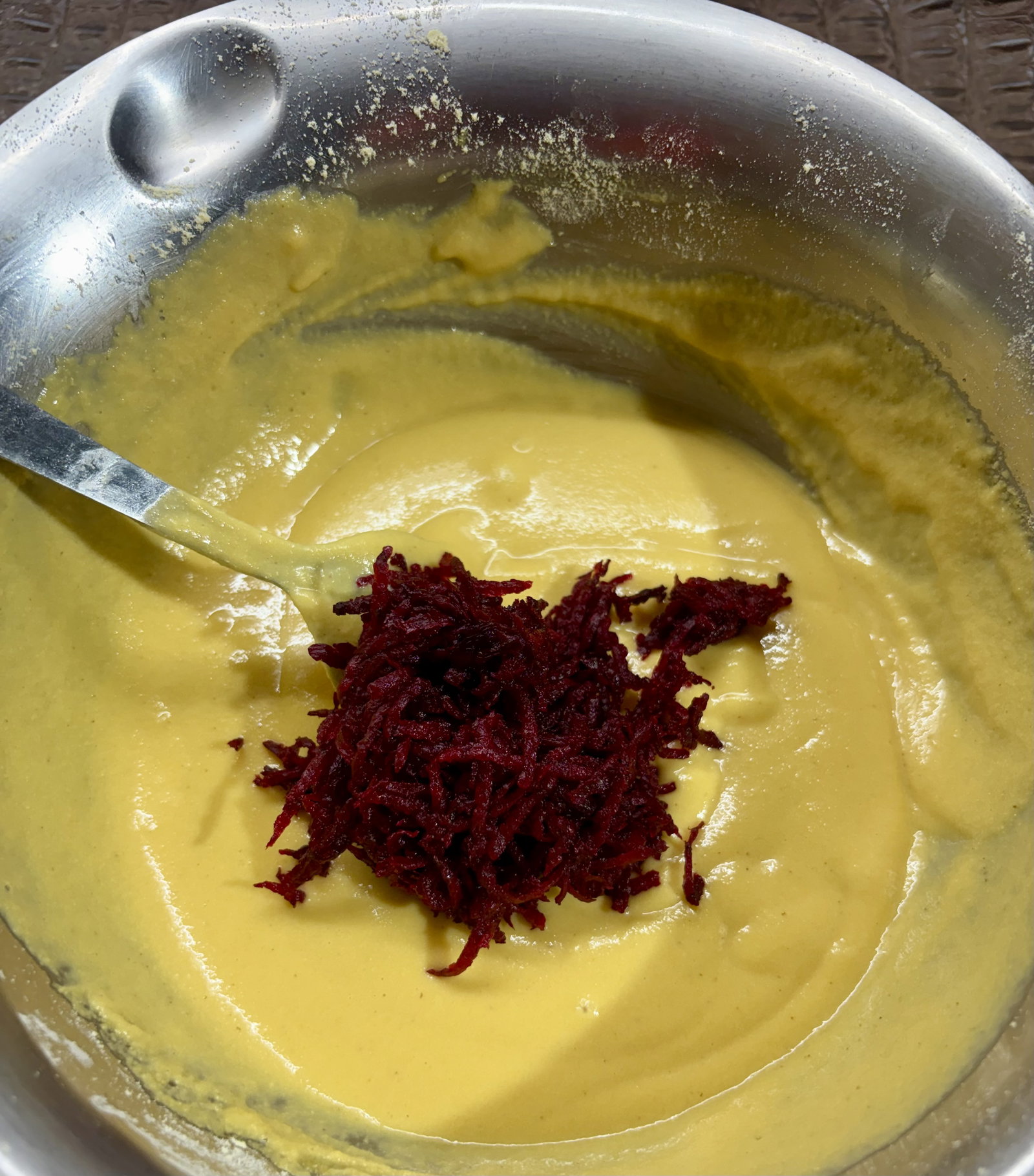 Step 1.1: Fold in the grated beetroot gently