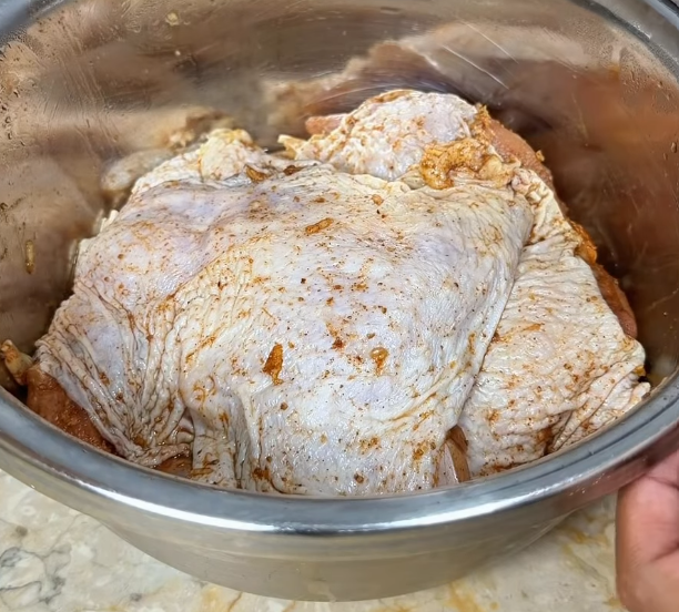 Step 1.1: Mix chicken thighs with garlic, salt, coriander powder, smoked paprika, sweet paprika, and white pepper until well coated