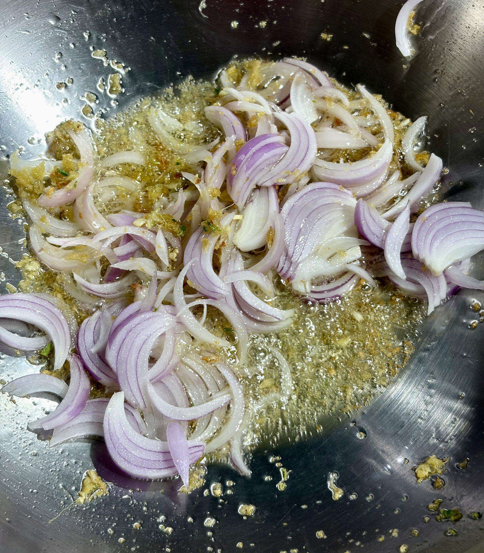 Step 2.1: Add chopped onions and cook until they turn golden brown at edges