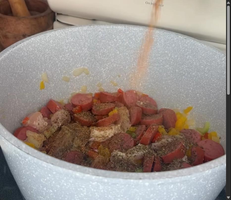 Step 2.1: Mix in andouille sausage, boneless skinless chicken breast, garlic, basil, thyme, and @tonychacheres creole seasoning