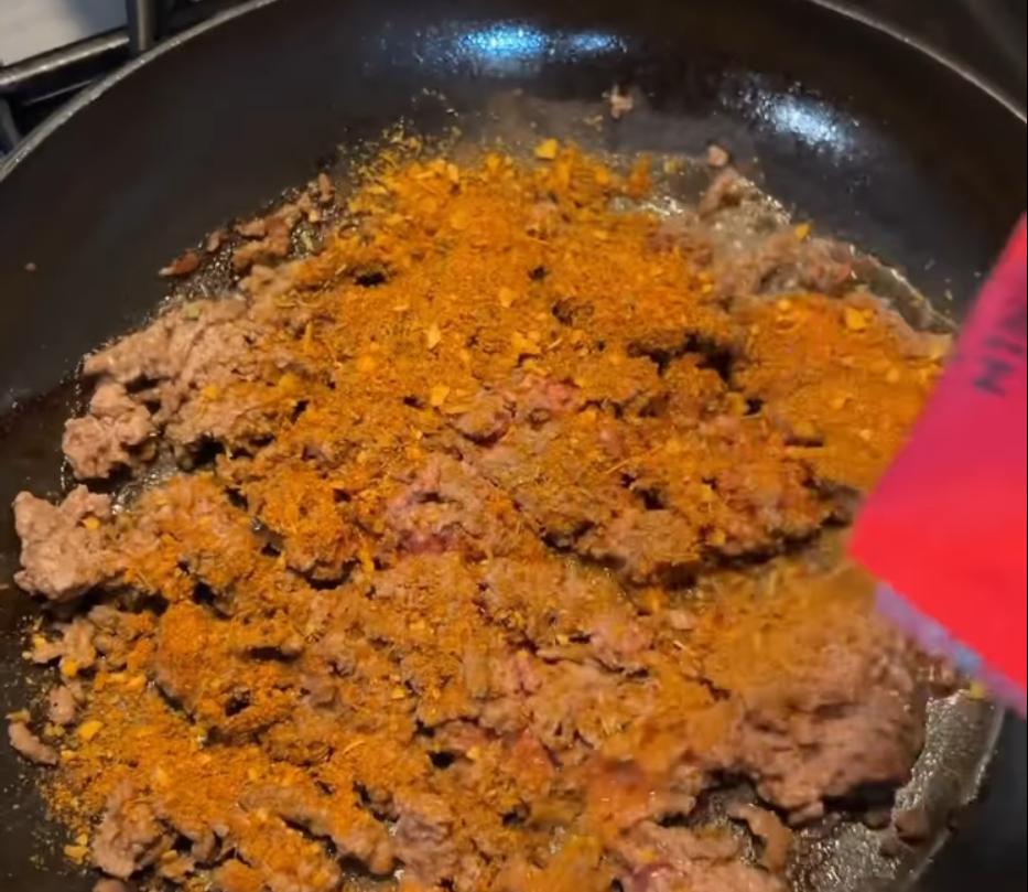Step 4.1: Cook beef mince in a pan over medium-high heat with seasoning, onion, and a splash of water
