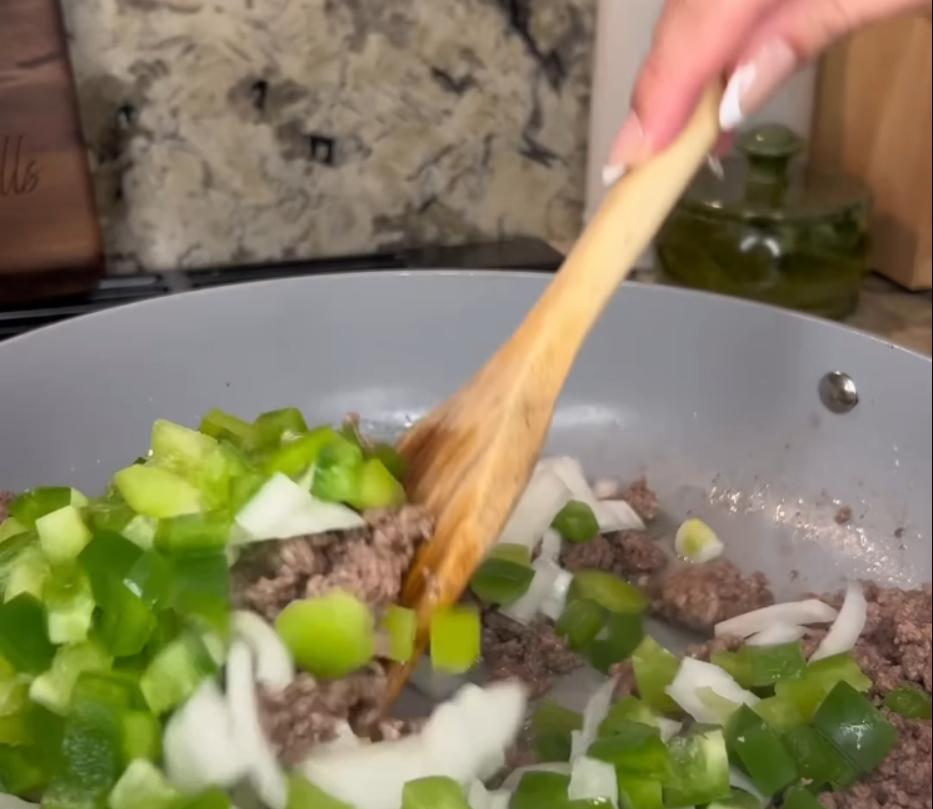 Step 1.1: Brown ground beef in a large sauté pan until cooked through