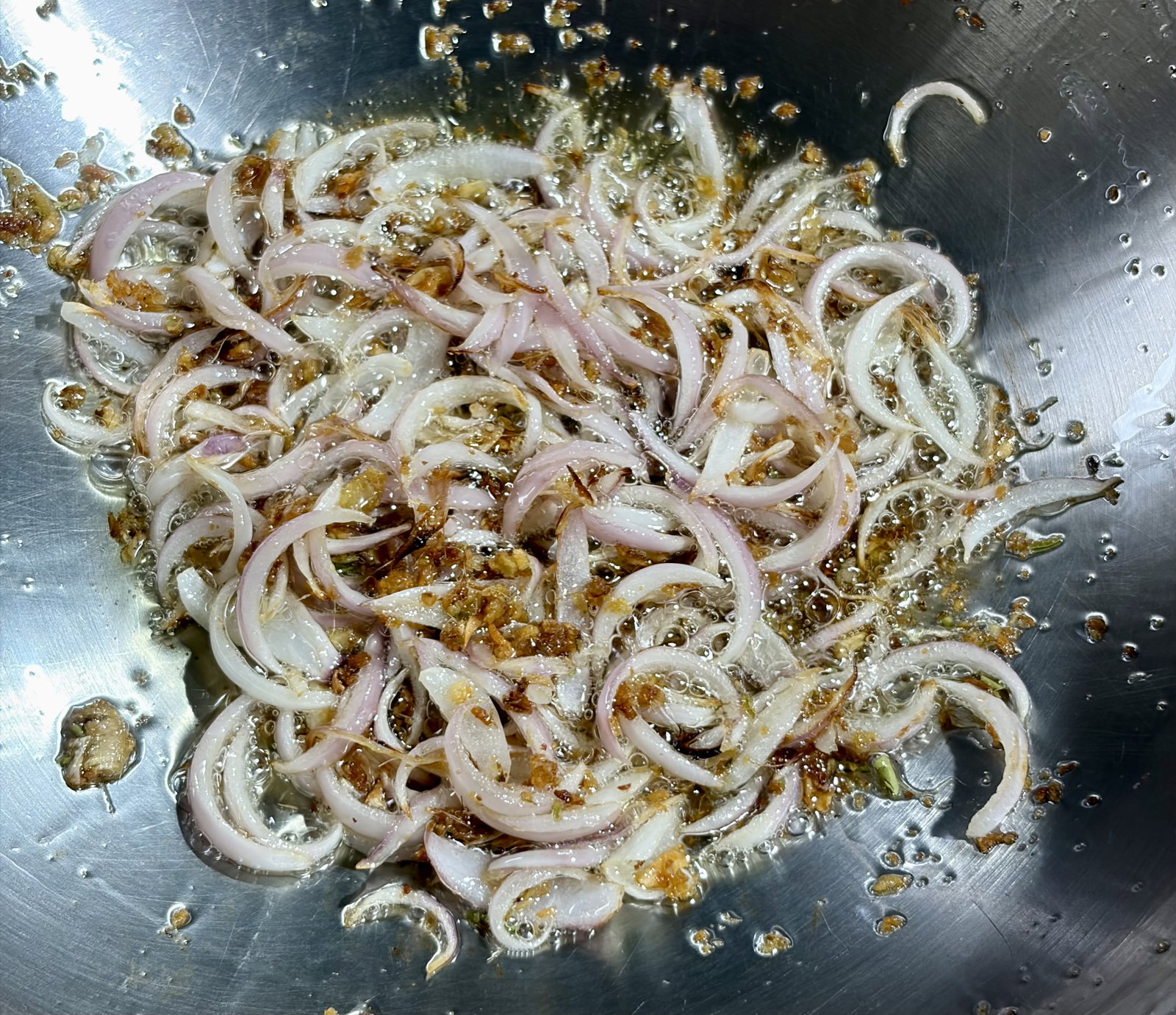 Step 2.2: Add chopped onions and cook until they turn golden brown at edges