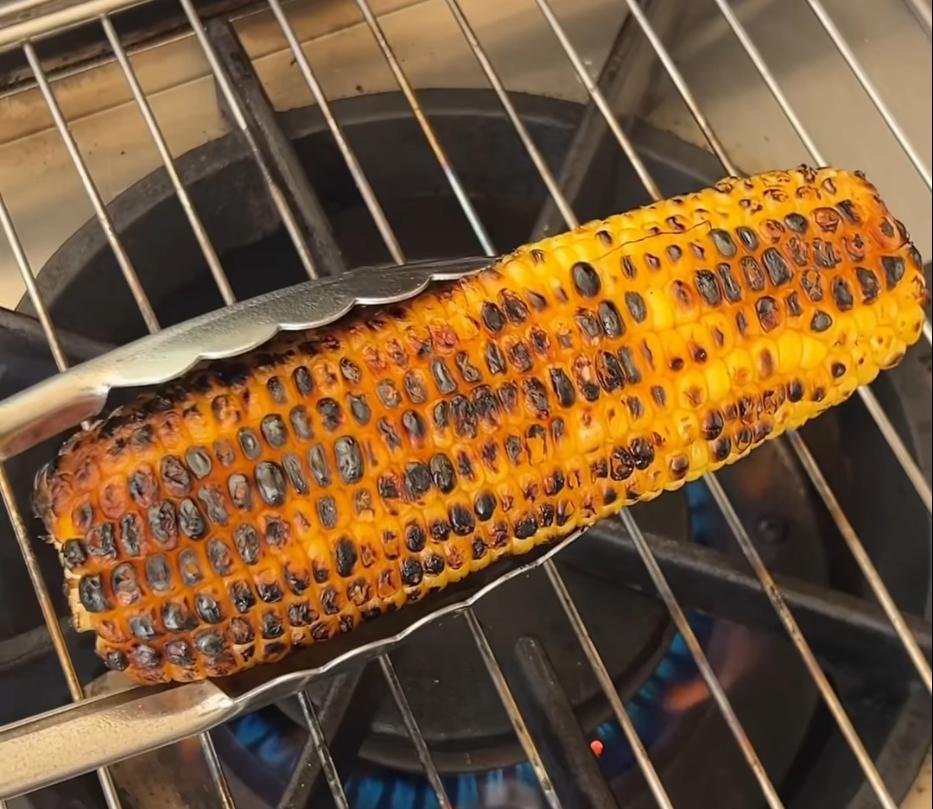 Step 3.1: Remove husk from corn and grill until charred