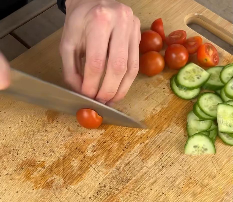 Step 1.1: Thinly slice the cucumber and red onion, halve the cherry tomatoes and roughly chop the coriander, mint and spring onion