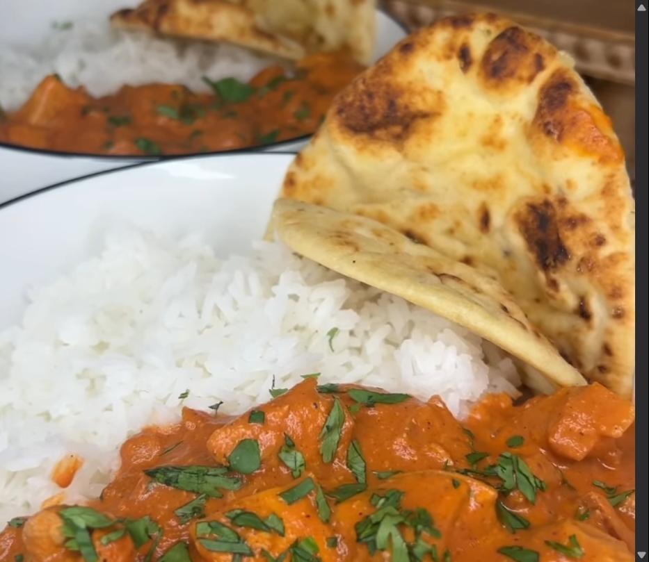 Step 4.1: Serve the chicken tikka masala over jasmine rice and garnish with chopped cilantro