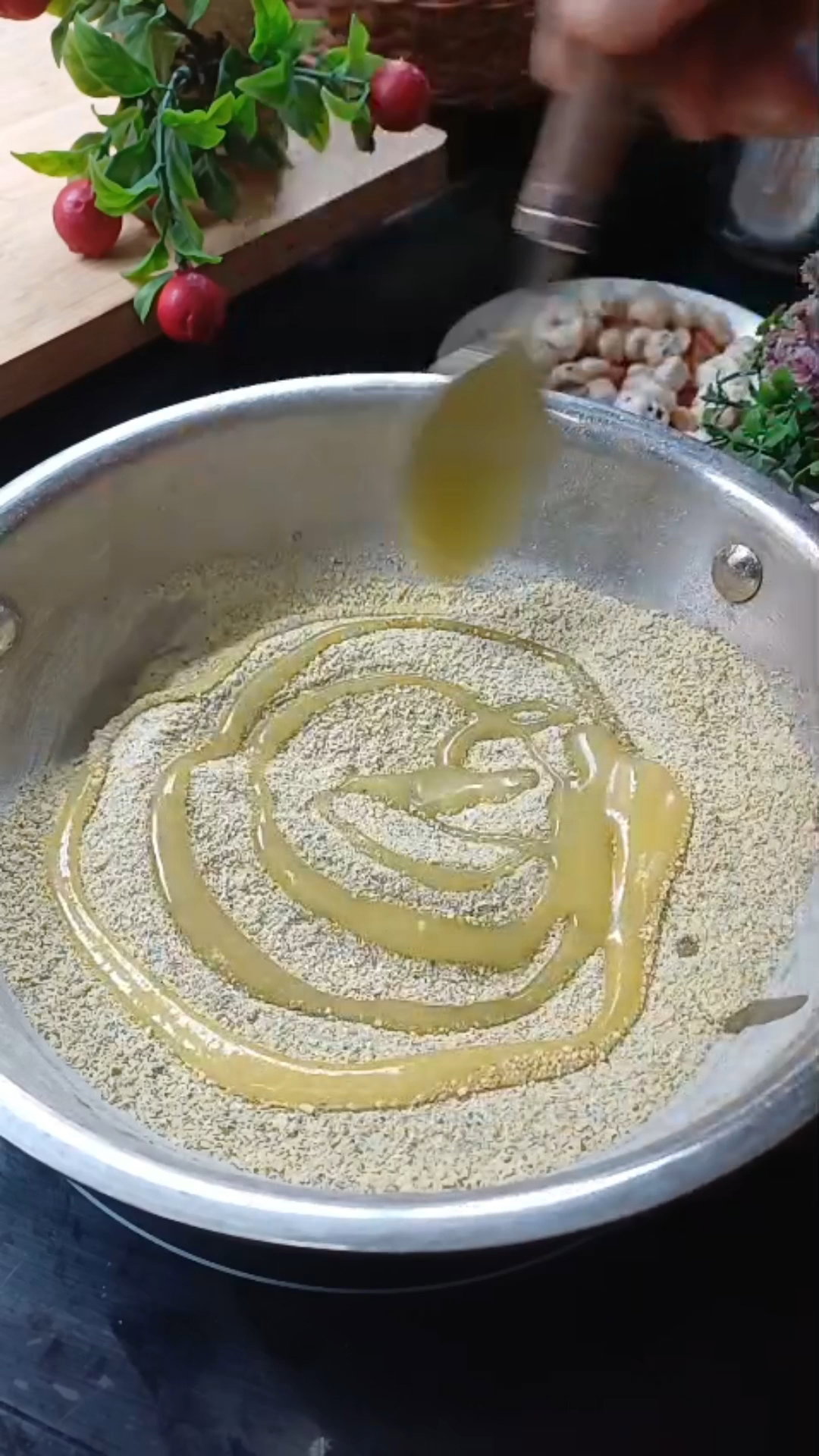 Step 1.1: Add the ground moong flour back to the pan along with 7 tbsp cow ghee