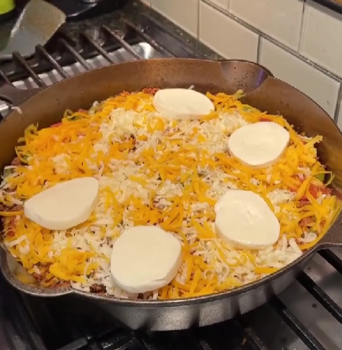 Step 3.2: Scatter pepperoni evenly over the beef mixture