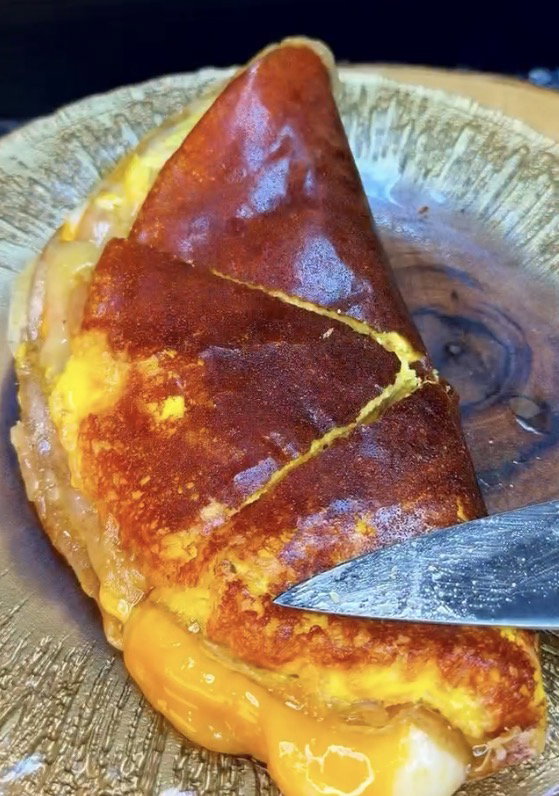 Step 1.1: Slice and serve immediately while the cheese is hot and gooey
